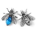 Vintage silver bee brooch with blue striped agate gemstone and pin mechanism detail - Blue Agate