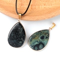 Deep green kambaba jasper waterdrop pendant with golden bezel edge and cord - Rhyolite