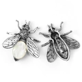 Vintage silver bee brooch with white mother of pearl inlay showing front and back view - White Shell