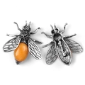 Vintage bee brooch with silver-tone wings and a large amber-colored oval stone - Topaz
