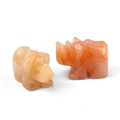 Miniature rhinoceros and hippo figures carved from natural sunstone and yellow jade - Topaz