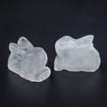 Pair of carved translucent white crystal rabbit figurines in a smooth polished stone finish - White Crystal