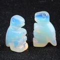 Ensemble de deux figurines de dinosaures en cristal d'opalite polie et reflets bleus - Opalite (Synthétique)