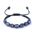 Pulsera de cuentas de sodalita hecha a mano con cordón trenzado negro ajustable - Piedra de Puntos Azules