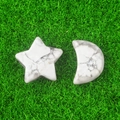 Polished white howlite stone set featuring five-pointed star and crescent moon shapes - Howlite