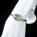 Natural green faceted stone bracelet with gold plating and brown woven cord - Green Strawberry Quartz