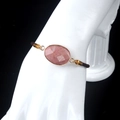 Adjustable faceted pink amethyst natural stone bracelet with gold plated edging - Rhodonite