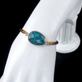 Handmade adjustable brown woven bracelet with faceted blue drop-shaped amethyst stone - Apatite