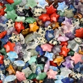 Polished star-shaped gemstone beads in tiger eye and amethyst for jewelry making - Multicolor