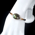 Adjustable faceted labradorite bracelet with golden metallic setting and woven cord - Labradorite