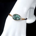 Natural faceted green stone bracelet with gold frame and brown braided cord - African Turquoise