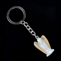 Miniature angel keychain pendant with white pearlescent body and clear wings on black base - Natural Agate