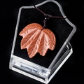 Goldstone maple leaf necklace with brown woven cord and leaf vein carving details - Gold Sandstone