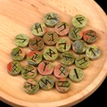 Polished Unakite stone set with golden engraved Elder Futhark Norse runes symbols - Unakite