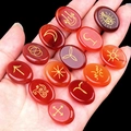 Set of 13 red agate witch rune stones with gold engraved symbols held in hand - 13 Pieces/Pack / Red Agate (1712)