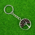 Handmade Tree of Life keychain featuring red natural crystal stones and silver wire wrapping - Garnet