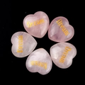 Natural rose quartz heart stones with golden Dream engraving for meditation and healing - Dream