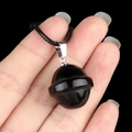 Deep black natural agate planet pendant with silver clasp and black braided cord - Planet Shape (1926) / Obsidian