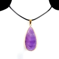 Purple crystal teardrop pendant necklace with gold plated frame and black cord - Amethyst