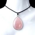 Pink teardrop crystal pendant necklace with silver plating on black woven cord - Rose Quartz (Silver Edging)