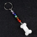 Rainbow gemstone beaded keychain featuring a white bone-shaped stone pendant - White Crystal