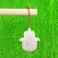 Translucent white agate Hamsa hand pendant with natural stone texture on brown cord - White Crystal