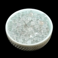 Transparent 4mm natural crystal beads in a light blue textured bowl on black background - Clear Quartz (Single Bead) 4mm No Hole
