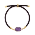 Adjustable woven bracelet with a faceted rectangular purple amethyst and gold trim - Purple Crystal