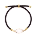 Adjustable woven bracelet with clear rectangular crystal and gold-plated trim detail - Howlite