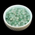 4mm translucent green aventurine natural stone beads in a beige ceramic bowl - Green Aventurine (Single Bead) 4mm No Hole