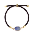 Adjustable woven bracelet with rectangular blue lapis lazuli stone and gold accents - Lapis Lazuli