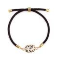 Adjustable woven rope bracelet featuring a rectangular spotted natural stone charm - Dalmatian Jasper