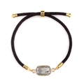 Adjustable cord bracelet featuring a rectangular grey labradorite stone with gold accents - Labradorite