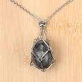 Silver cage pendant necklace with dark grey natural crystal stone and bamboo chain - Black Flash Stone Egg