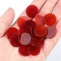 Set of round red agate carnelian cabochons shown on palm for DIY jewelry making - Small Round Disc (1 Piece)