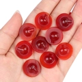 Red translucent oval carnelian agate gemstone cabochons held in hand for DIY jewelry - Small Hat Shape (1 Piece)
