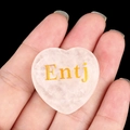 Pink heart-shaped crystal stone engraved with ENTJ gold letters for personality gifts - Commander/Entj