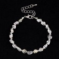 Irregular green rutilated quartz stone bracelet with silver spacer beads and lobster clasp - Topaz