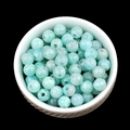 Natural light blue Amazonite round loose beads with pre-drilled holes in a white bowl - 6mm-2mm Amazonite