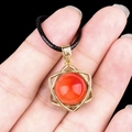 Golden hexagram star pendant with a translucent red agate stone on a black cord - Red Agate (Gold)