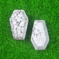 Set di due bare in howlite bianca con venature grigie su un prato verde acceso - Howlite