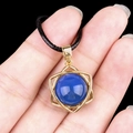 Hexagram necklace featuring a blue round agate pendant in a golden frame with black cord - Blue Agate (Gold)