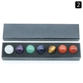 Set de sept boules de cristal chakra naturelles de 25mm dans un coffret noir - Emballage en boîte