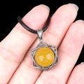 Silver hexagram pendant with bright yellow stone and black cord, hand-held detail - Yellow Agate (Silver)