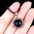 Hexagram necklace featuring a polished black onyx stone set in a silver geometric frame - Black Agate (Silver)