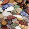Variety of carved crystal wing pendants featuring natural tiger eye and aventurine stones - Mixed Random