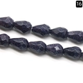 Cuentas de gota en piedra de arena azul oscuro facetada con destellos dorados - Piedra de Sol Azul (Sintética)