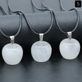 Three translucent white crystal apple pendants with silver clasps and black woven cords - 20mm Clear Quartz