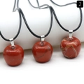 Three red jasper apple pendants with natural stone textures and black woven necklace cords - 20mm Rainbow Stone