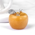 Golden natural crystal apple ornament with silver sparkling leaf on white fabric - Topaz